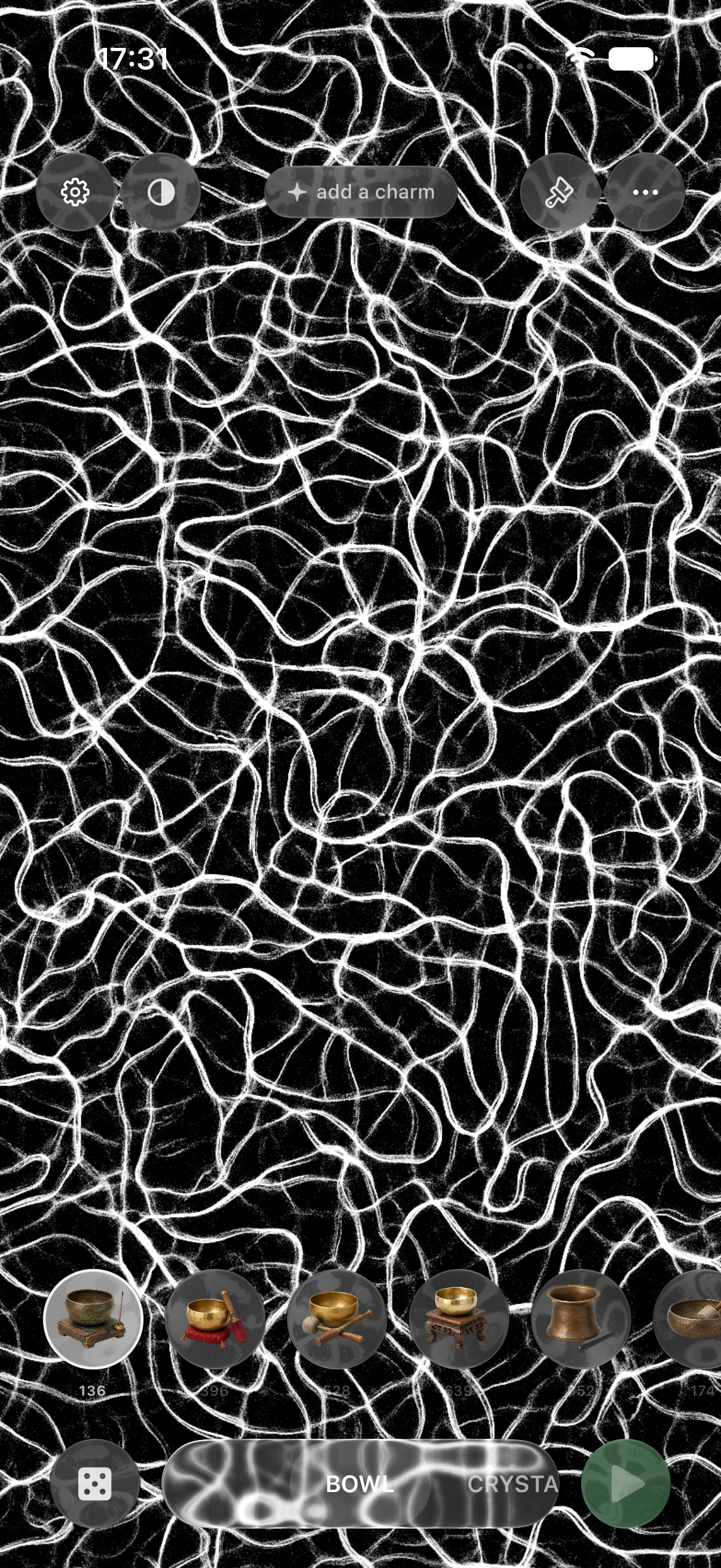 Touch Grass app with flowing black-and-white patterns and singing bowl controls